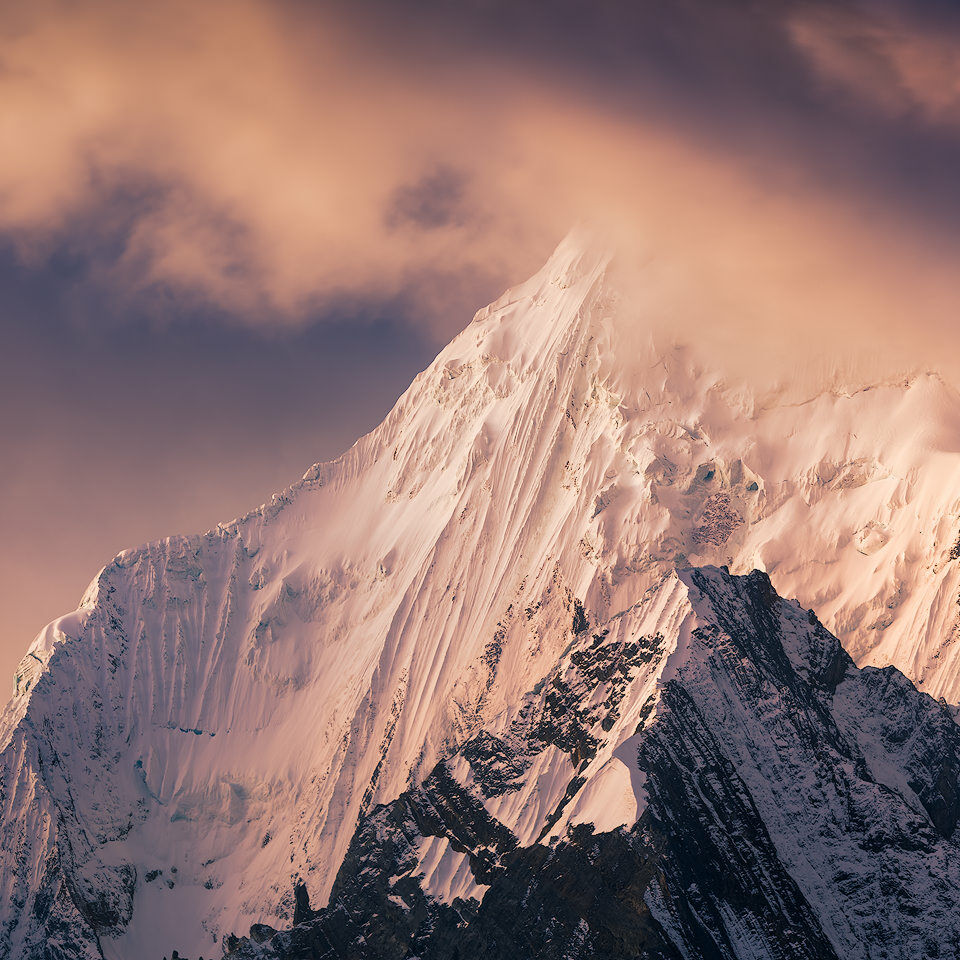 Sunset light on a mountain in Cordillera Huayhuash.