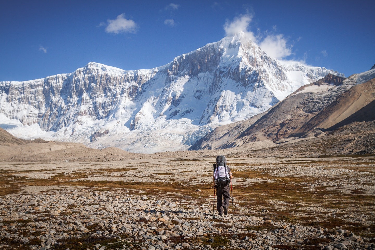 Hiker walking in east face of Monte San Lorenzo